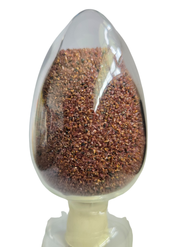 A large egg containing Garnet Sand for sandblasting and waterjet cutting applications.