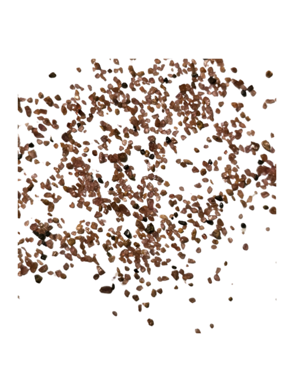 A pile of brown Garnet Sand seeds displayed on a clean white background.